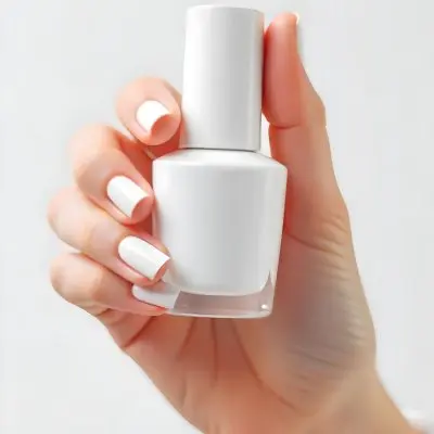 A Woman S Hand With White Nail Polish Holding A White Nail Polish Bottle White Background 8 836f
