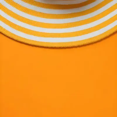 A Yellow And White Striped Hat On An Orange Backgr 4 96ba