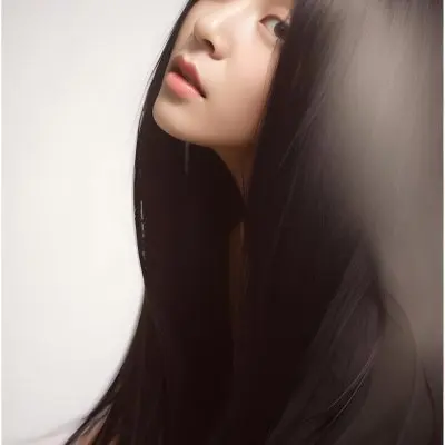 A Young Asian Woman With Long Straight Black Hair Covering Part Of Her Face Wearing A Summer Dress In Bright Sunlight 7 13db