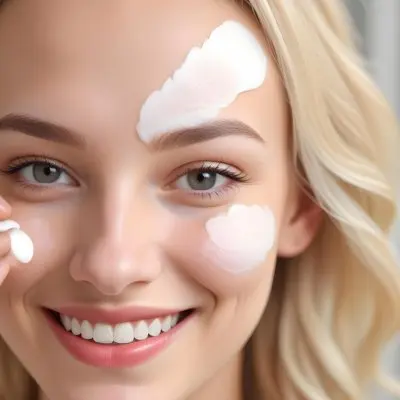 A Young Caucasian Woman With Long Blonde Hair And Blue Eyes Applying A Facial Cosmetic Product While Looking At The Camera And Smiling In A Brightly Lit Room B413