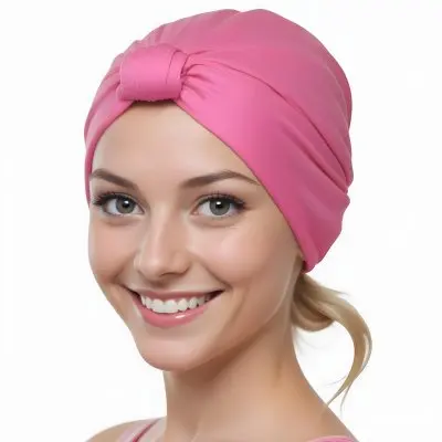 A Young Caucasian Woman With Long Blonde Hair Wearing A Pink Turban Style Headwrap Smiling At The Camera 6 7dba