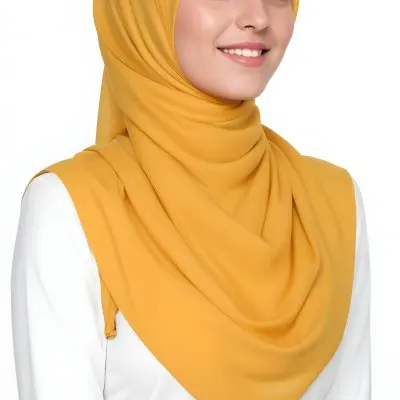A Young Middle Eastern Woman With Dark Hair Wearing A Bright Yellow Hijab Smiling At The Camera 17 5930