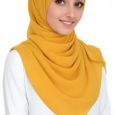 A Young Middle Eastern Woman With Dark Hair Wearing A Bright Yellow Hijab Smiling At The Camera 19 5a63