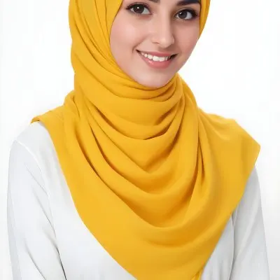 A Young Middle Eastern Woman With Dark Hair Wearing A Bright Yellow Hijab Smiling At The Camera 2 379d