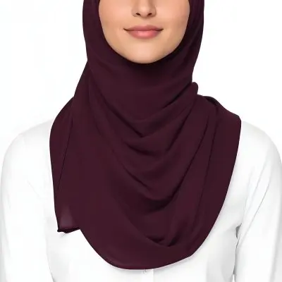 A Young Middle Eastern Woman With Dark Hair Wearing A Burgundy Hijab Smiling At The Camera 22 7797