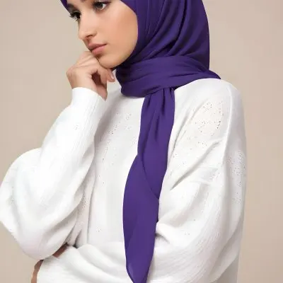 A Young Middle Eastern Woman With Dark Hair Wearing A Purple Hijab Looking Directly At The Camera With A Serious Expression 10 7ce0