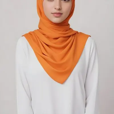 A Young Southeast Asian Woman With Long Dark Hair Wearing An Orange Hijab And A White Top 10 4734