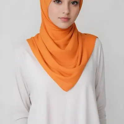 A Young Southeast Asian Woman With Long Dark Hair Wearing An Orange Hijab And A White Top 16 46a8