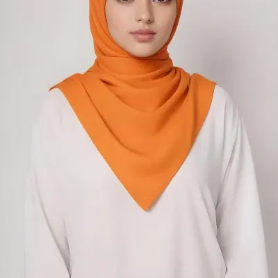 A Young Southeast Asian Woman With Long Dark Hair Wearing An Orange Hijab And A White Top 17 4673