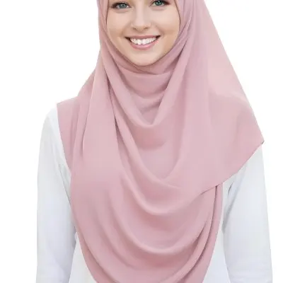 A Young Woman With Light Brown Skin Wearing A Pink Hijab And Smiling At The Camera 9 B53d