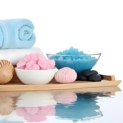 Adorable Cartoon Style A Wooden Tray With Spa Items Including Blue Bath Salts In A Glass Bowl White And Pink Soaps A Small White Bottle And Decorative Shells There Are Also Two Rolled Towels In Light Blue And Pink 14 59a9