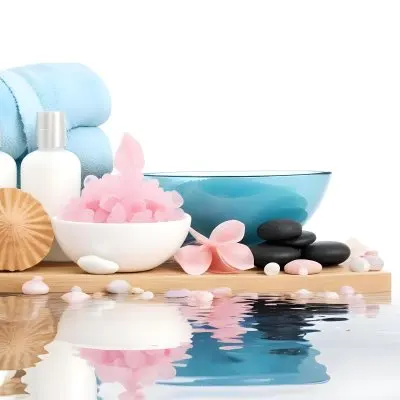 Adorable Cartoon Style A Wooden Tray With Spa Items Including Blue Bath Salts In A Glass Bowl White And Pink Soaps A Small White Bottle And Decorative Shells There Are Also Two Rolled Towels In Light Blue And Pink 9 31e2