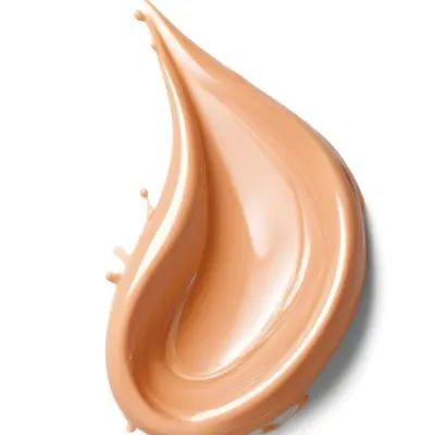 An Orange Swirl Of Creamy Substance Possibly A Cosmetic Product Or Makeup 14 8c92
