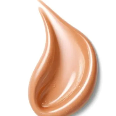 An Orange Swirl Of Creamy Substance Possibly A Cosmetic Product Or Makeup 4 B3bc