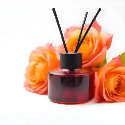 Aromatic Essence In A White Glass Bottle With Glass Sticks Surrounded By Three White Roses On A Black Background 23 7b0d