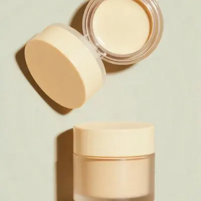 Assorted Makeup Compacts In Various Shades Of Beige Arranged On A Light Background 8 884b