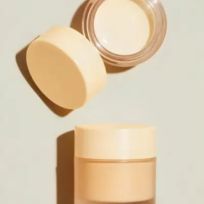 Assorted Makeup Compacts In Various Shades Of Beige Arranged On A Light Background 9 C9c0