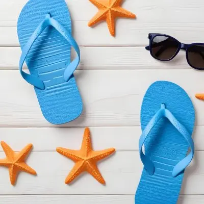 Blue Flip Flops With Sunglasses And Starfish On A White Wooden Surface Summer Vacation Concept Beach Accessories Top View Flat Lay 14 E33c
