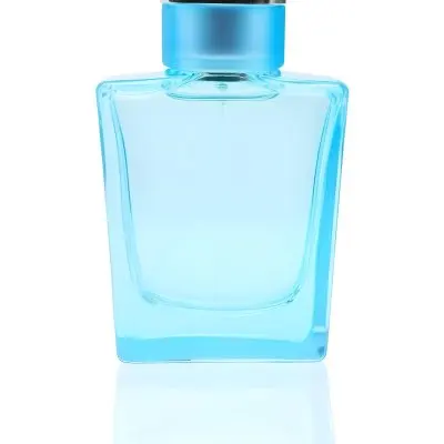 Blue Glass Perfume Bottle With A Silver Cap On A White Background 16 C45f