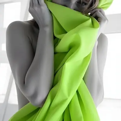 Caucasian Woman Age 25 With Brown Hair Partially Covered By A Vibrant Green Fabric In A Minimalist Gray And White Indoor Setting 15 Abb3