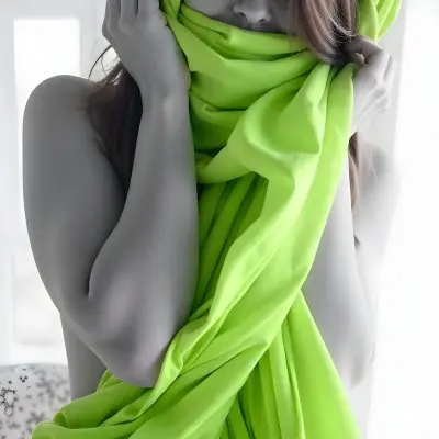 Caucasian Woman Age 25 With Brown Hair Partially Covered By A Vibrant Green Fabric In A Minimalist Gray And White Indoor Setting 19 9bad