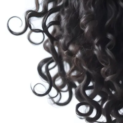 Close Up Of Curly Black Hair With Natural Light In The Background 52 4c7c