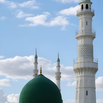 A Green Domed Mosque With A Tall Minaret Against A Blue Sky With Clouds 2 9331