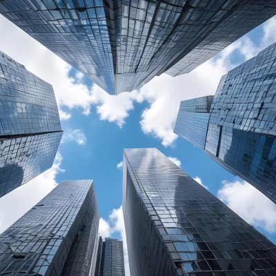 Worm S Eye View Of Modern Skyscrapers With Glass And Steel Facades Reaching Towards A Blue Sky With Scattered Clouds Creating A Sense Of Urban Grandeur 3 A7ca