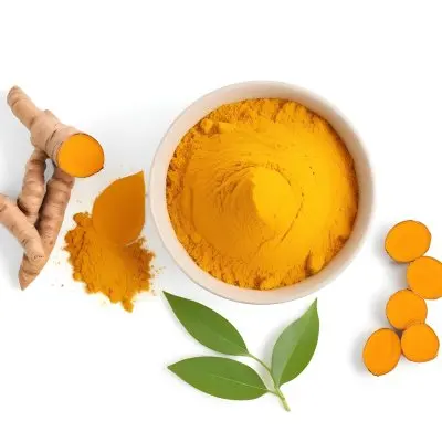 A Bowl Of Bright Yellow Turmeric Powder Surrounded By Fresh Turmeric Roots And Leaves 1 8c16