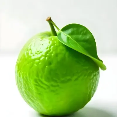 A Green Lime With A Leaf On A White Surface Bright Light Studio Shot Food Photography 24 B425