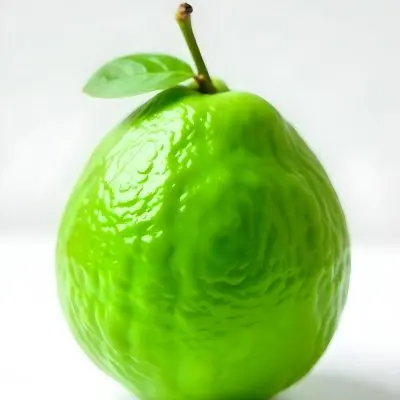 A Green Lime With A Leaf On A White Surface Bright Light Studio Shot Food Photography 29 750f