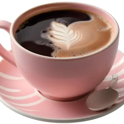 A Pink Ceramic Cup Filled With A Creamy Frothy Latte Or Cappuccino Featuring An Intricate Latte Art Design On The Surface Of The Drink Placed On A Wooden Table In A Sunlit Kitchen With Morning Ligh 12 Bbc0