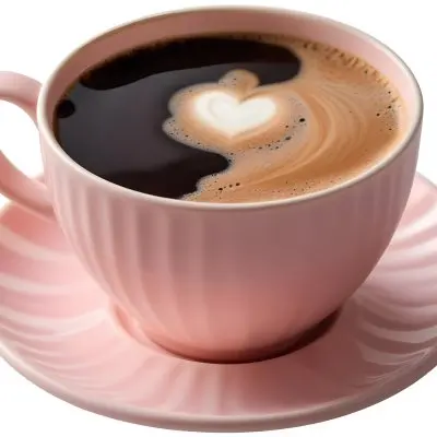 A Pink Ceramic Cup Filled With A Creamy Frothy Latte Or Cappuccino Featuring An Intricate Latte Art Design On The Surface Of The Drink Placed On A Wooden Table In A Sunlit Kitchen With Morning Ligh 6 98a0