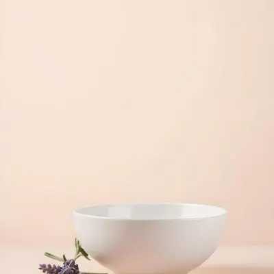 A White Ceramic Bowl With A Sprig Of Lavender On A Peach Colored Background Minimalist Composition Soft Lighting Clean Aesthetic Product Photography Product Shot 17 Feca