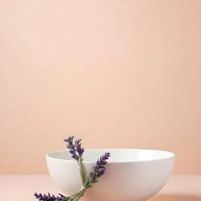 A White Ceramic Bowl With A Sprig Of Lavender On A Peach Colored Background Minimalist Composition Soft Lighting Clean Aesthetic Product Photography Product Shot 5 23a7
