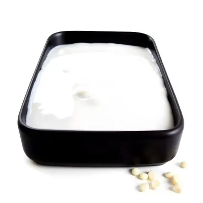 A White Square Plate With Rounded Corners Filled With White Liquid On A White Background 5 36eb