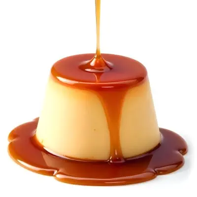 Caramel Flan With Caramel Syrup Being Poured On Top On A White Background 14 Ed4f