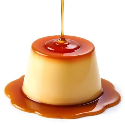 Caramel Flan With Caramel Syrup Being Poured On Top On A White Background 16 0386