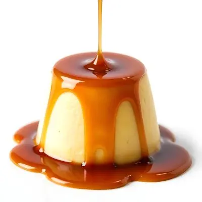 Caramel Flan With Caramel Syrup Being Poured On Top On A White Background 18 Bb46