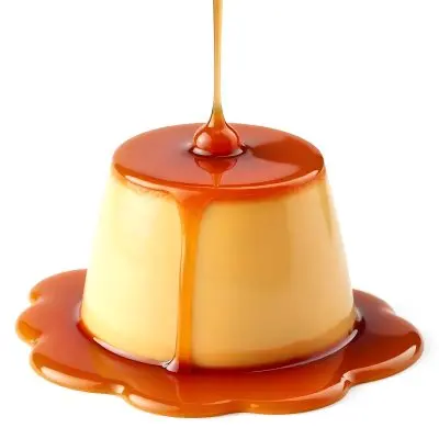 Caramel Flan With Caramel Syrup Being Poured On Top On A White Background 38 222b