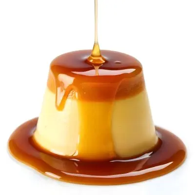 Caramel Flan With Caramel Syrup Being Poured On Top On A White Background 43 D94c