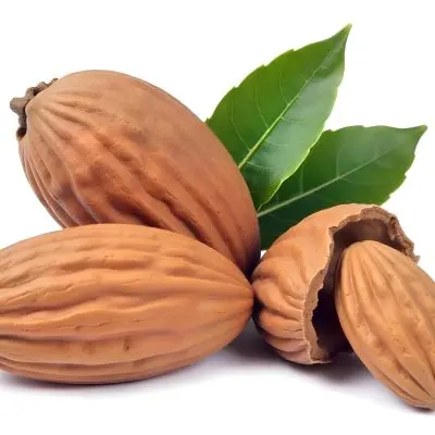 Pile Of Almonds With Green Leaves Close Up 18 542d