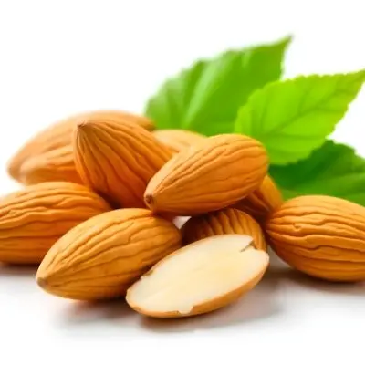 Pile Of Almonds With Green Leaves Close Up 3 E0d5