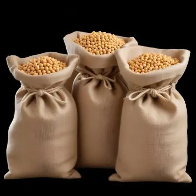 Three Jute Sacks Filled With Soybeans Tied With String Creating A Rustic And Textured Composition Against A Black Background 2 Ff2d