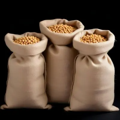 Three Jute Sacks Filled With Soybeans Tied With String Creating A Rustic And Textured Composition Against A Black Background 3 Fd37