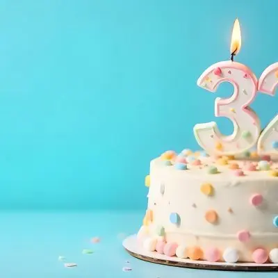A Birthday Cake With Pastel Colors And A Number 32 Candle On Top In Front Of A Blue Background 9 3113