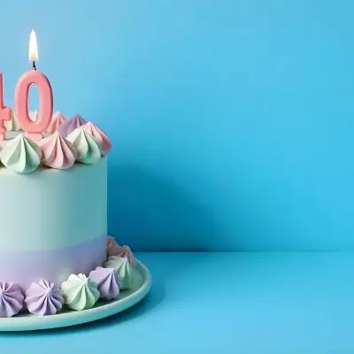 A Birthday Cake With Pastel Colors And Number 40 Candles On A Green Plate Light Purple And Green Frosting Plain White Background 12 A687