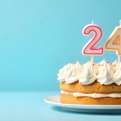 A Birthday Cake With White Frosting And A Candle In The Shape Of The Number 24 Light Blue Background 13 Eb64
