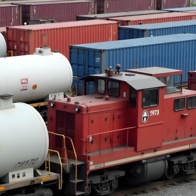 Rows Of Cargo Containers And Tanker Trucks In An Industrial Storage Yard 3 23ee