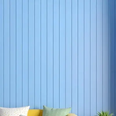 A Blue Wooden Wall With Vertical Planks A Cushions In The Foreground 10 B213